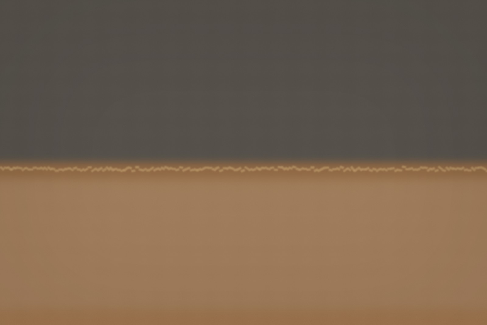 Field, Late Light — large horizontal painting on linen, charcoal and amber tonal field